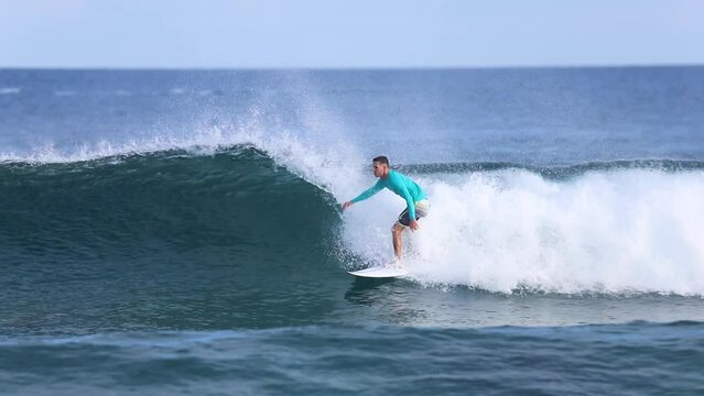 Video of surfer at blue ocean wave. High quality FullHD footage