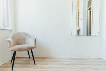 Armchair in a bright room interior mirror