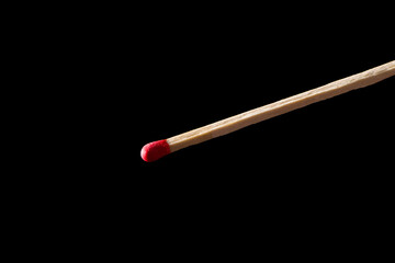 wooden match isolated on black background