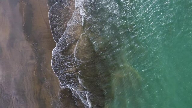 Aerial sea wave on sand in Bangladesh's sea beach of Cox's Bazar