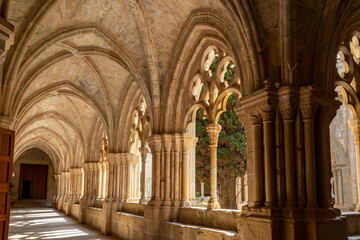 Beautiful cloister of the Poblet Monastery. Tarragona, Spain - obrazy, fototapety, plakaty