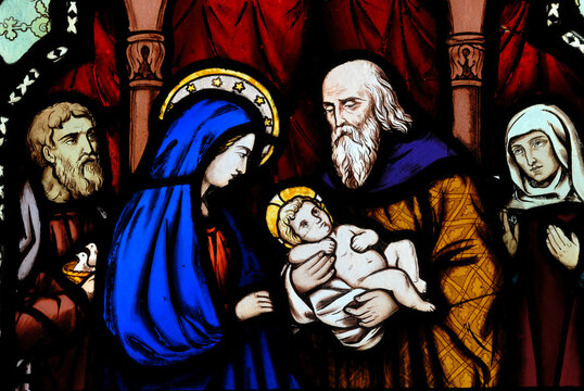 stained glass window in a church, depicting Mary and Baby Jesus