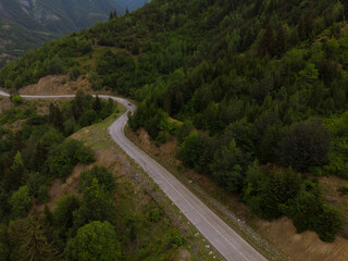 Summer mountain valley, beautifull road way to Mestia. Tsalanari, Hebudi, Georgia. Nature and car travel concept. Asphalt road among the mountains