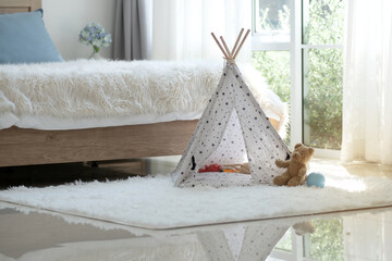 Bedroom with dog house teddy bear toy ball on white fur rug