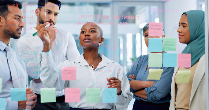 Meeting, Collaboration And Sticky Notes On Glass With A Business Black Woman Coaching Her Team In The Office. Strategy, Teamwork And Planning With A Creative Man And Woman Employee Group At Work