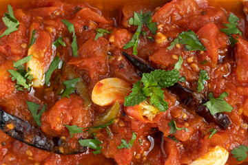 Tangy And Spicy Tomato Chutney Also Called Lehsoon Pyaaj Tamatar Ki Namkeen Chatni Or Chutney Prepared From Fresh Roasted Tomatoes Spiced With Pyaj, Lehsun, Garlic, Pyaaz, Onion Paste And Garam Masala