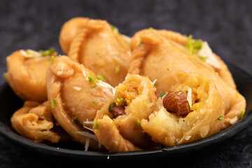 Gujia Also Called Gujiya, Pirukiya, Pirukia, Pedakiya, Karanji, Basundi Or Gughra Stuffed With Mawa, Khoya, Chasni, Mava, Khoa - Indian Sweet Dumpling Enjoyed On Deepawali, Teez, Holi, Diwali And Teej