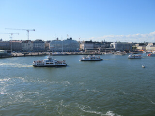 Fototapeta na wymiar Ferries and buildings in Helsinki on a summer day