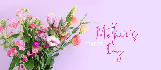 Obraz na płótnie Canvas mother's day concept with pink and purple flowers over pastel background