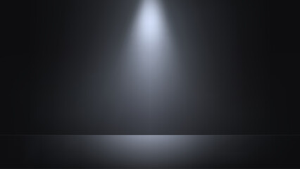 Black studio background with spotlight