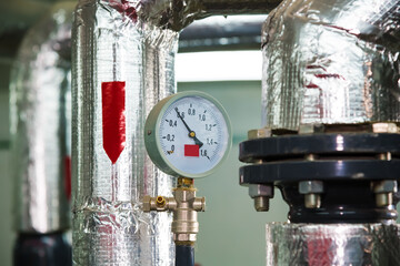 Manometer, pipes and faucet valves of heating system