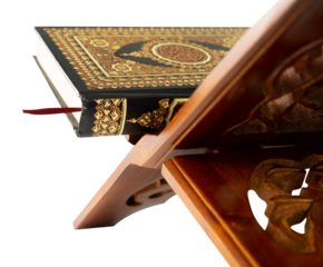 Quran on wooden table