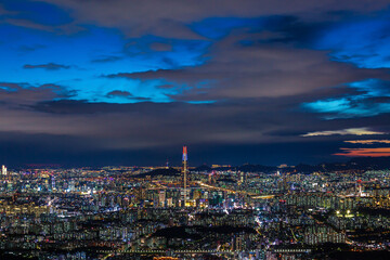 Seoul City skyline and downtown and skyscraper at night  is The best view and beautiful of South Korea at Namhansanseong mountain.