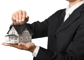 Businessman Holding House Model, Real Estate Concept
