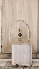 A historical public ablution  Ottoman Mosque. Close Up View of Ablution Fountains and stools.  Ramadan prayer background.