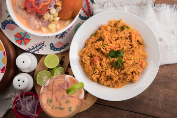Arroz con mariscos Sea food risotto ceviche Assorted food plates Peru traditional comfort food buffet table