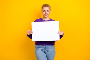 Photo of adorable nice lady wear stylish violet jumper hold poster protest for women rights empty space isolated on yellow color background