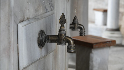 A historical public ablution place in the courtyard of the Ottoman Mosque. Close Up View of...