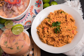Arroz con mariscos Sea food ceviche Assorted food plates Peru traditional comfort food buffet table