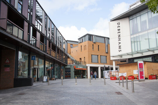 People on the High Street in Exeter, Devon in the UK