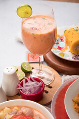 Leche de tigre Sea food ceviche Assorted food plates Peru traditional comfort food buffet table