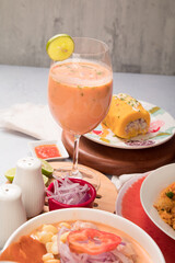 Leche de tigre Sea food ceviche Assorted food plates Peru traditional comfort food buffet table