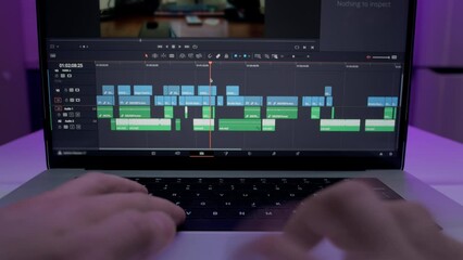 Timelapse of the editor's work on a laptop at home. Creates a creative video clip for film production. The interface of the program for video color correction. Makes a video blog for social networks