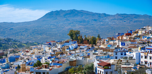 Naklejka na ściany i meble Panoramic of blue city of Chefchaouen in the Rif mountains, Morocco