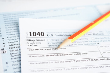 Obraz premium Tax form 1040 U.S. Individual Income Tax Return, business finance concept.