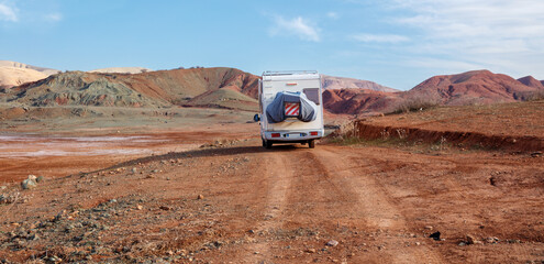 Motor home driving in the road in Morocco- road trip, adventure in Morocco