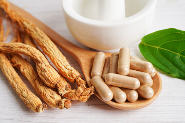 Ginseng roots and green leaf, healthy food.