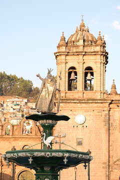 Statue of Pachacuti, the Plaza de Armas, Cusco with Cathedral view. Pachacuti was the ninth ruler of the Kingdom of Cusco.