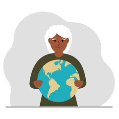 A woman deposits the planet Earth in his hand. Earth day holiday concept, saving the planet, global warming or climate change.