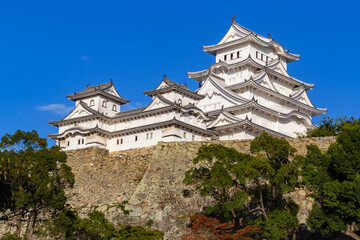 Fototapeta premium Ancient Samurai Castle of Himeji with Blue Cloudy Sky. Japan.