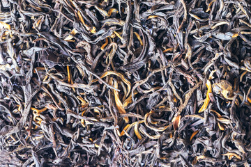 Black tea background. Black tea shot close up. Black tea macro.Top view. Close up. High resolution.