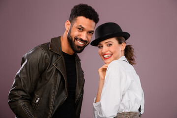 Portrait of young multiracial couple, studio shoot.
