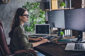 Profile side photo of clever serious woman boss it company hacking sites earn money develop skills...