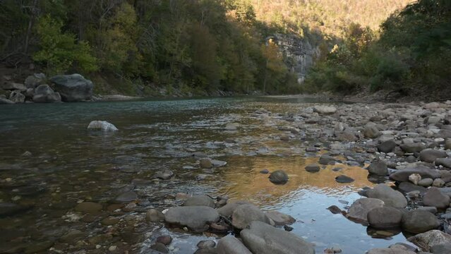 Buffalo National River with cliff view and yellow reflection. 