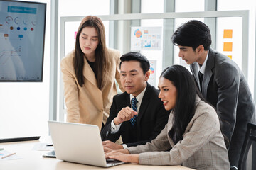 Office colleagues having casual discussion during meeting in conference room, Business and office concept, business team with laptop computers and documents