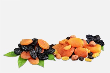 Dried tasty healthy fruits on background