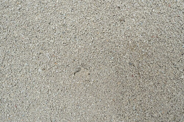 Background of domestic animal toilet gravel for urine absorbing. Abstract pattern of sand in animal toilet box.