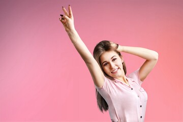 Fototapeta premium Happy young smart woman posing on background