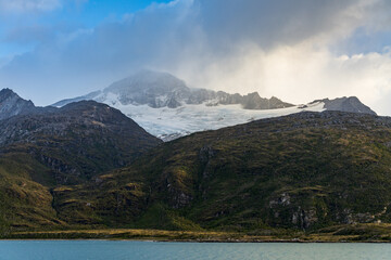 Ice and snow on mountains in Glacier Alley of Beagle channel in Chile