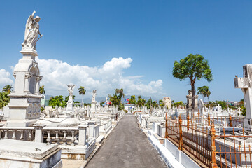 Fototapeta premium Rich decorated graves at the Santa Ifigenia Cemetery in Santiago de Cuba, Cuba, Caribbean