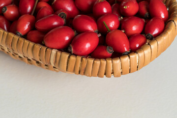 Ripe rose hips harvested for making preserves for the winter, close-up. Healthy eating.