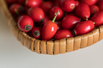 Ripe rose hips harvested for making preserves for the winter, close-up. Healthy eating.