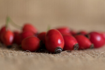 Ripe rose hips harvested for making preserves for the winter, close-up. Healthy eating.