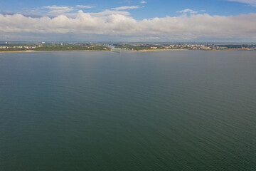 drone photography of sea, coastline and harbor