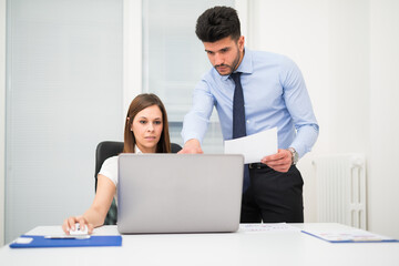 Business people at work in their office