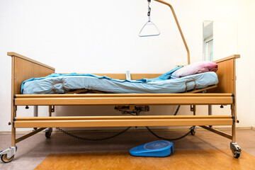 side view of homecare adjustable electric hospital bed at home